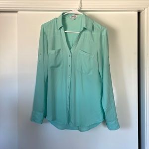 Size S blouse. Teal like color.